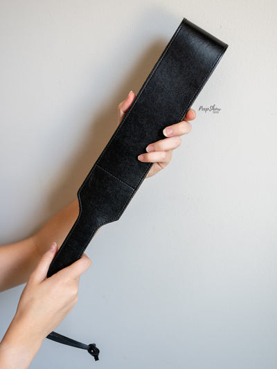 Leather Open Folded Paddle in hand