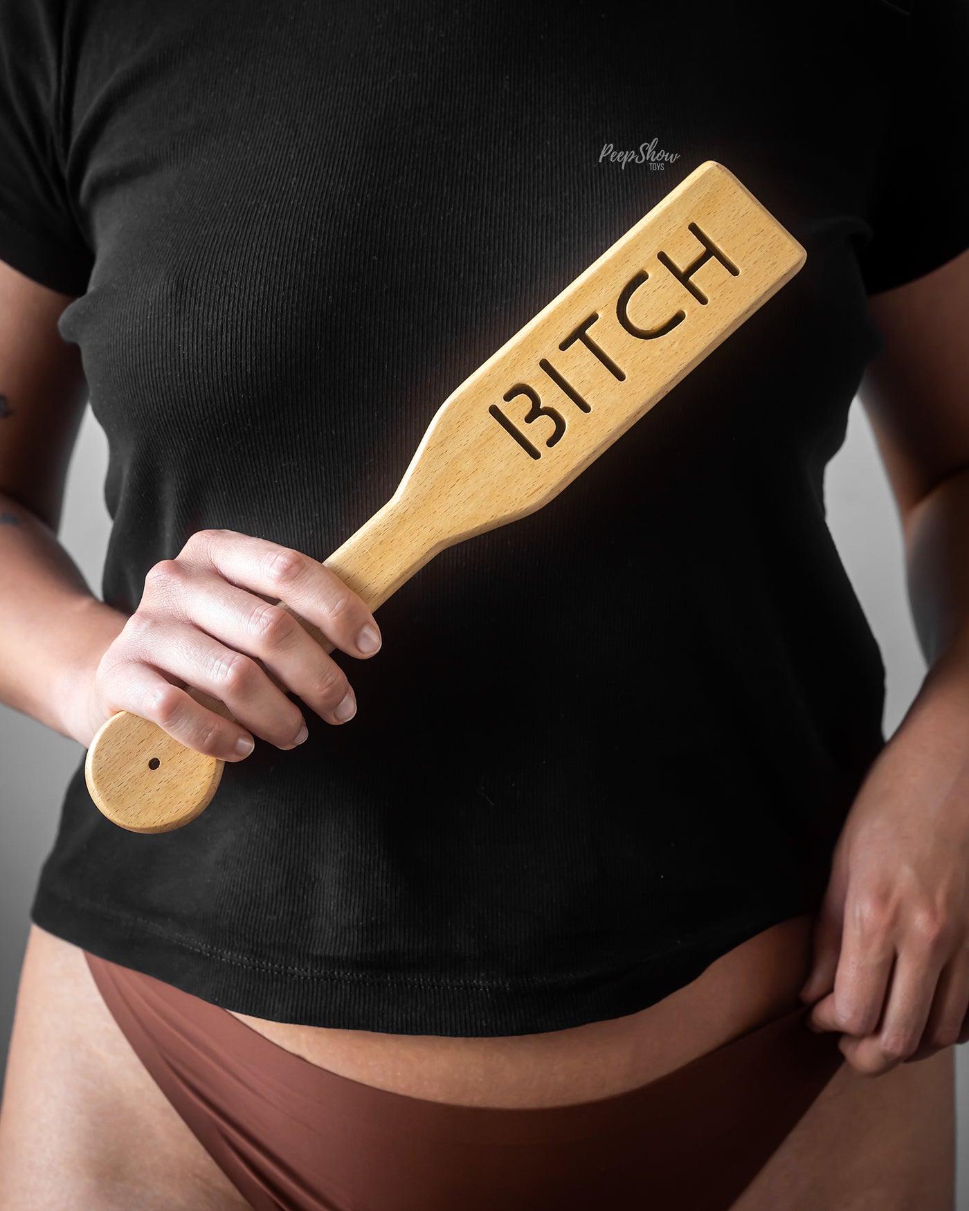 Wooden Paddle with the word "BITCH" Peepshow Toys